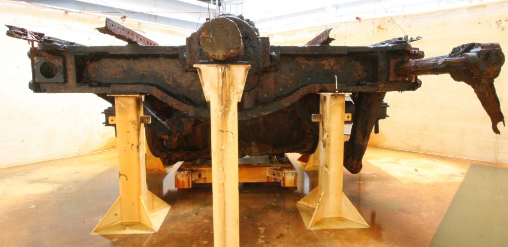 This view is taken aft, looking forward. Again, the engine is upside down. Note the massive nine-inch diameter wrought iron propeller shaft extending from the rear of the engine. Believe it or not, another 20-feet of propulsion shaft and packing seal extended from this nub before connection to the cast iron propeller.