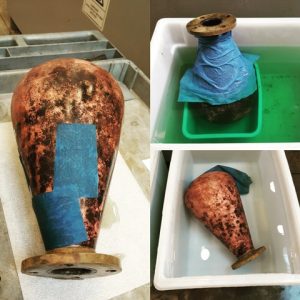 在处理空气瓶的图片:化学和机械清洗技术被使用